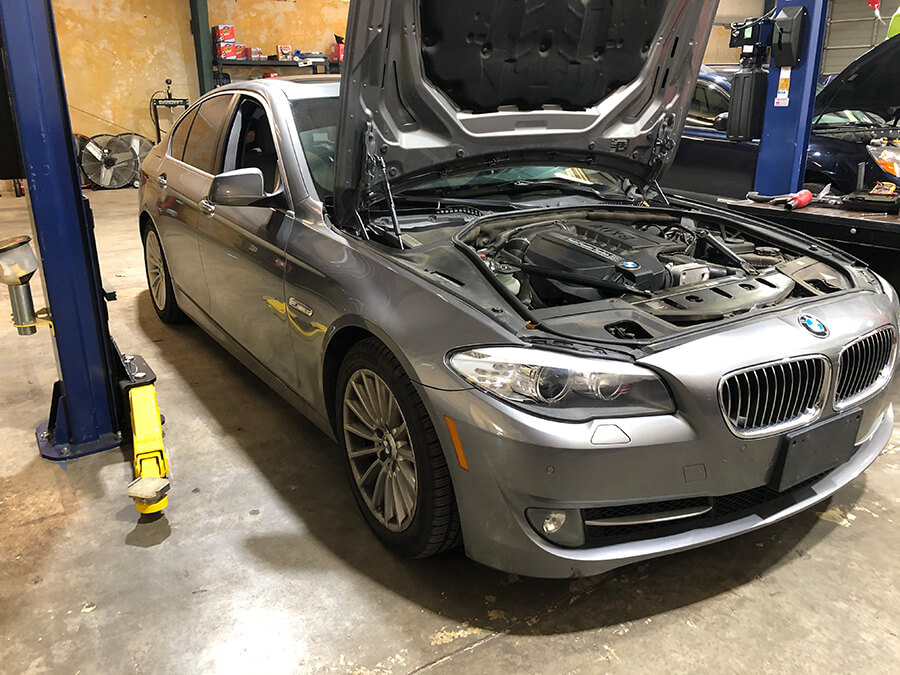 BMW hood open oil leak